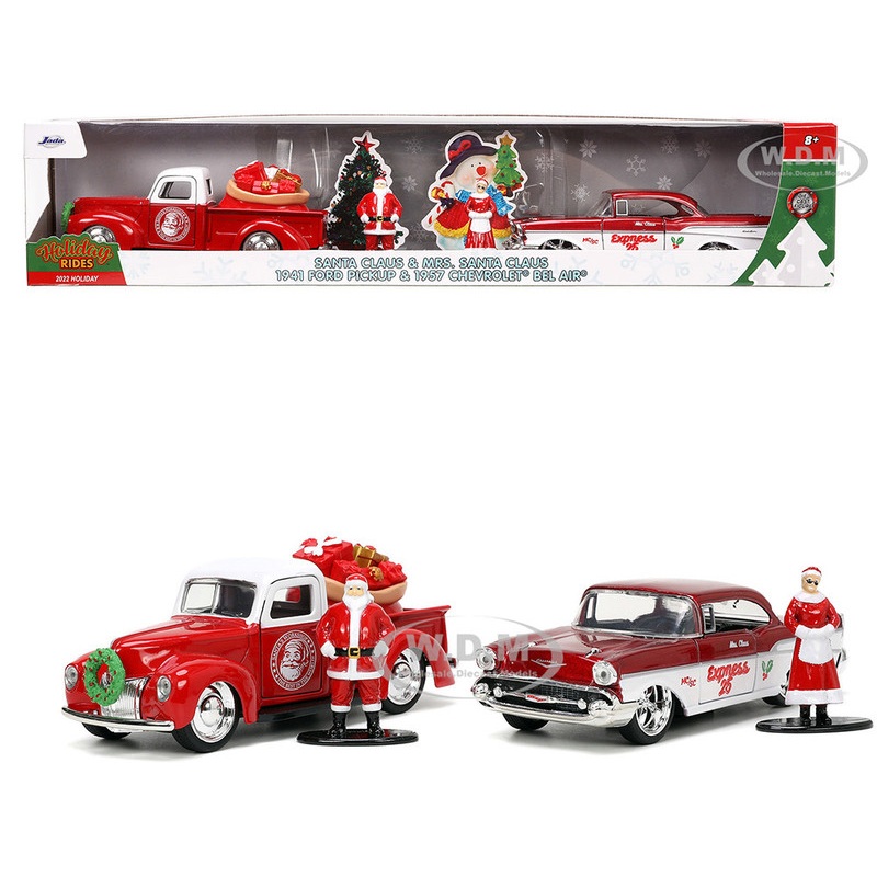 1941 Ford Pickup Truck Red and White Santa’s Workshop and 1957 Chevrolet Bel Air Red Metallic and White Express 25 with Mr. and Mrs. Santa Claus Diecast Figures Holiday Rides Series 1/32 Diecast Model Cars by Jada
