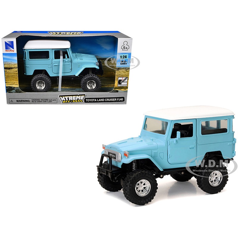 Toyota Land Cruiser FJ40 Light Blue with White Top Xtreme Off-Road Series 1/24 Diecast Model by New Ray