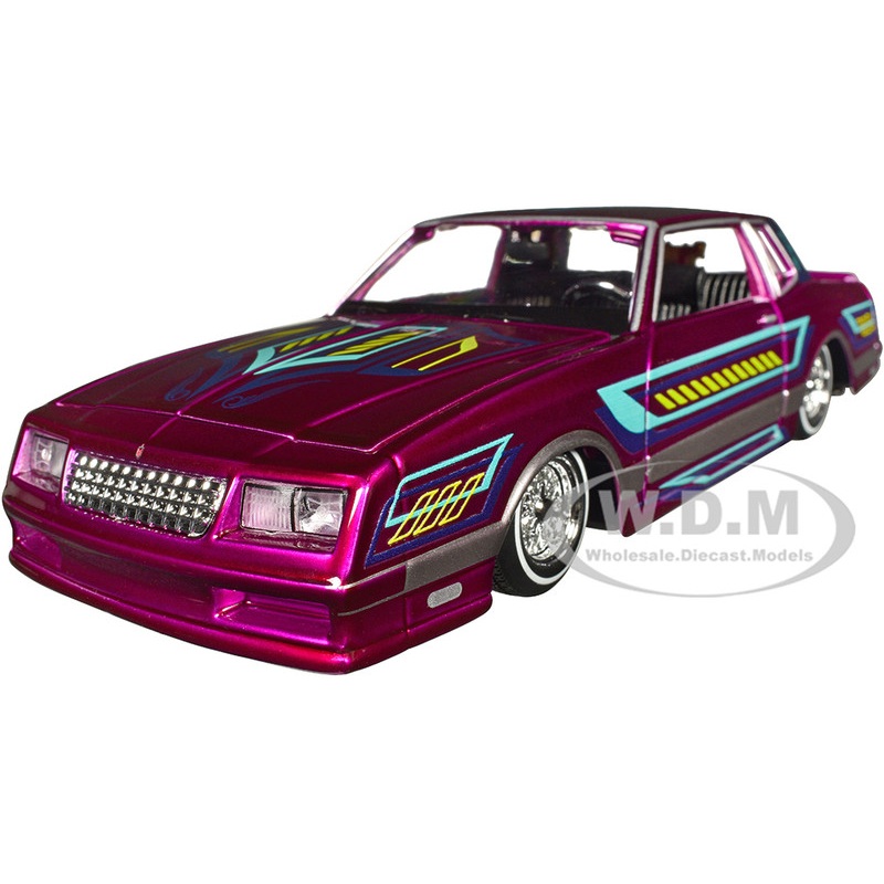 1986 Chevrolet Monte Carlo SS Lowrider Pink Metallic with Graphics Lowriders Series 1/24 Diecast Model Car by Maisto
