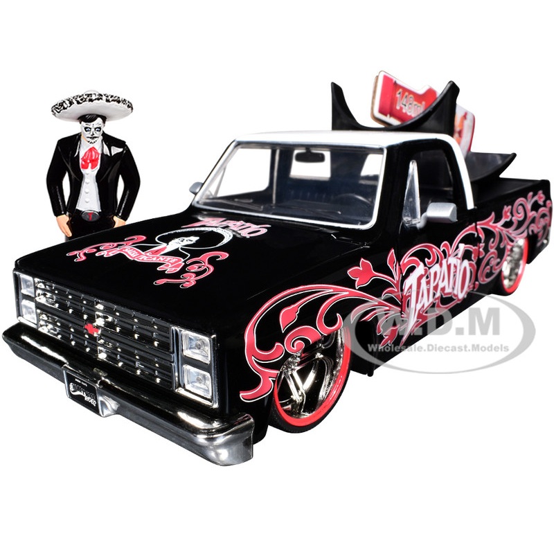 1985 Chevrolet C-10 Pickup Truck Black with White Top and Graphics with Charro Man Diecast Figure Tapatio 1/24 Diecast Model Car by Jada