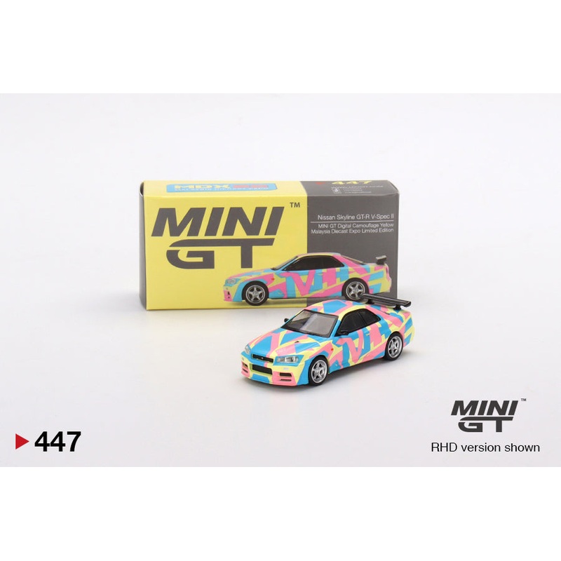 MINI GT #447 1/64 Nissan Skyline GT-R (R34)V-Spec ll MINI GT Digital Camouflage Yellow
