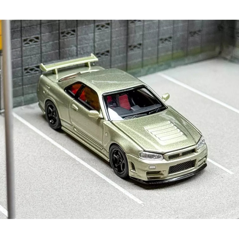 Motorhelix 1/64 NISSAN SKYLINE GT-R R34 V SPEC II  E – MILLENNIUM JADE M63405